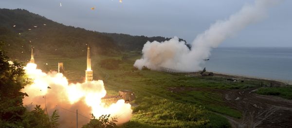 In this photo provided by South Korea Defense Ministry, South Korea's Hyunmoo II Missile system, left, and U.S. Army Tactical Missile System, right, fire missiles during the combined military exercise between the two countries against North Korea at an undisclosed location in South Korea, Saturday, July 29, 2017. In this photo provided by South Korea Defense Ministry, South Korea's Hyunmoo II Missile system, left, and U.S. Army Tactical Missile System, right, fire missiles during the combined military exercise between the two countries against North Korea at an undisclosed location in South Korea, Saturday, July 29, 2017. - Sputnik International