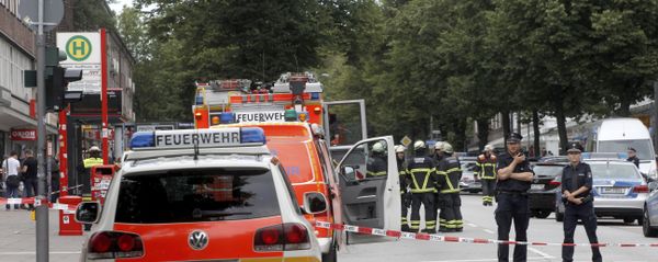 Police officers and fire engines stand in front of the supermarket in Hamburg, Germany, Friday, July 28, 2017 Police officers and fire engines stand in front of the supermarket in Hamburg, Germany, Friday, July 28, 2017 - Sputnik International