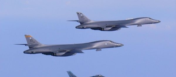 Two U.S. Air Force B-1B Lancer bombers fly a 10-hour mission from Andersen Air Force Base, Guam, escorted by a Japan Air Self-Defense Force F-2 fighter jet into Japanese airspace and then over the Korean Peninsula, July 30, 2017 Two U.S. Air Force B-1B Lancer bombers fly a 10-hour mission from Andersen Air Force Base, Guam, escorted by a Japan Air Self-Defense Force F-2 fighter jet into Japanese airspace and then over the Korean Peninsula, July 30, 2017 - Sputnik International