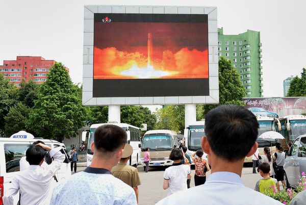 People watch news report showing North Korea's Hwasong-14 missile launch on electronic screen at Pyongyang station, North Korea in this photo taken by Kyodo on July 29, 2017 People watch news report showing North Korea's Hwasong-14 missile launch on electronic screen at Pyongyang station, North Korea in this photo taken by Kyodo on July 29, 2017 - Sputnik International