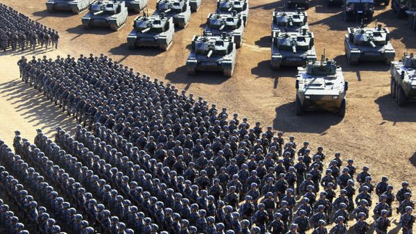 In this photo released by China's Xinhua News Agency, Chinese People's Liberation Army (PLA) troops march past military vehicles Sunday, July 30, 2017 as they arrive for a military parade to commemorate the 90th anniversary of the founding of the PLA on Aug. 1 at Zhurihe training base in north China's Inner Mongolia Autonomous Region - Sputnik International