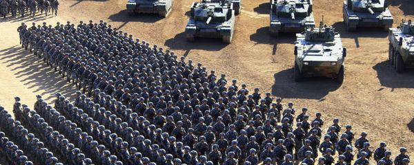 In this photo released by China's Xinhua News Agency, Chinese People's Liberation Army (PLA) troops march past military vehicles Sunday, July 30, 2017 as they arrive for a military parade to commemorate the 90th anniversary of the founding of the PLA on Aug. 1 at Zhurihe training base in north China's Inner Mongolia Autonomous Region - Sputnik International