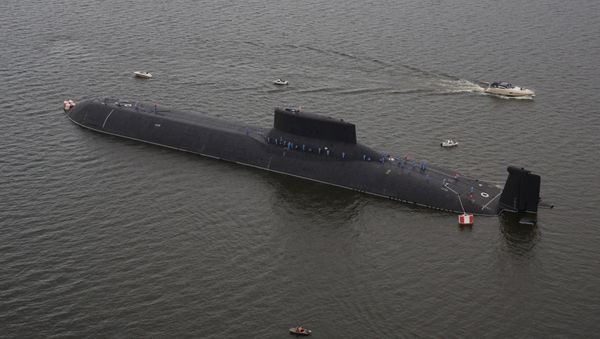An aerial view shows the Russian nuclear submarine Dmitry Donskoy moored on the eve of the the Navy Day parade in Kronshtadt, a seaport town in the suburb of St. Petersburg, Russia, July 28, 2017 - Sputnik International