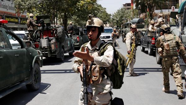 Afghan security forces arrive during gun fire at the site of an attack in Kabul, Afghanistan July 31, 2017 - Sputnik International