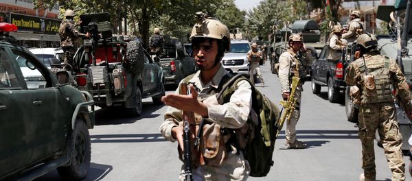 Afghan security forces arrive during gun fire at the site of an attack in Kabul, Afghanistan July 31, 2017 - Sputnik International