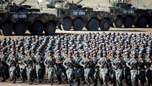 Soldiers of China's People's Liberation Army (PLA) get ready for the military parade to commemorate the 90th anniversary of the foundation of the army at Zhurihe military training base in Inner Mongolia Autonomous Region, China, July 30, 2017 - Sputnik International