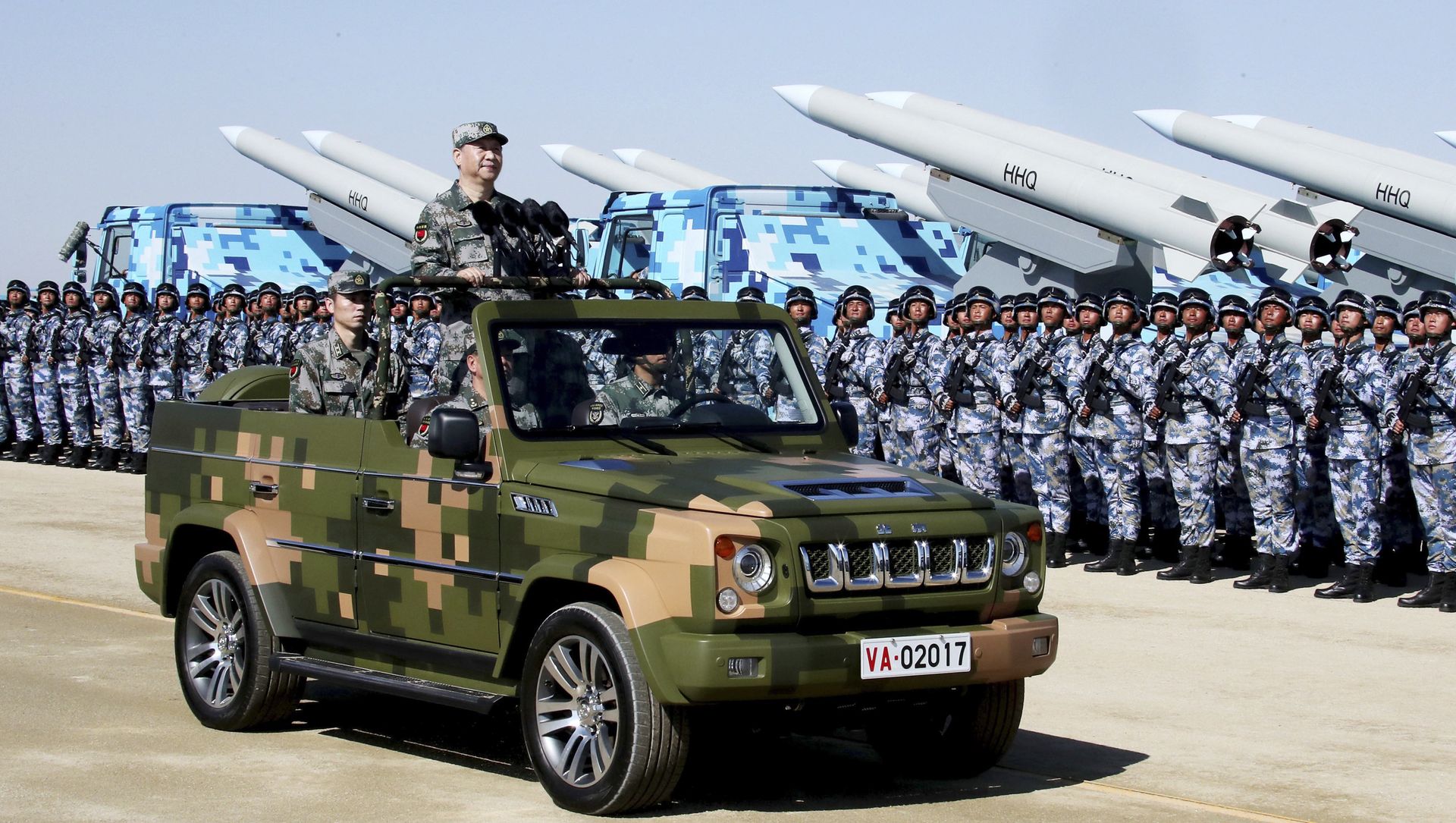 In this photo released by Xinhua News Agency, Chinese President Xi Jinping stands on a military jeep as he inspects troops of the People's Liberation Army during a military parade to commemorate the 90th anniversary of the founding of the PLA at Zhurihe training base in north China's Inner Mongolia Autonomous Region, Sunday, July 30, 2017 In this photo released by Xinhua News Agency, Chinese President Xi Jinping stands on a military jeep as he inspects troops of the People's Liberation Army during a military parade to commemorate the 90th anniversary of the founding of the PLA at Zhurihe training base in north China's Inner Mongolia Autonomous Region, Sunday, July 30, 2017 - Sputnik International, 1920, 09.03.2021