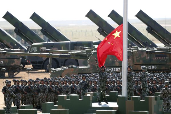 In this photo released by China's Xinhua News Agency, Chinese People's Liberation Army (PLA) troops perform a flag raising ceremony Sunday, July 30, 2017 for a military parade to commemorate the 90th anniversary of the founding of the PLA on Aug. 1 at Zhurihe training base in north China's Inner Mongolia Autonomous Region In this photo released by China's Xinhua News Agency, Chinese People's Liberation Army (PLA) troops perform a flag raising ceremony Sunday, July 30, 2017 for a military parade to commemorate the 90th anniversary of the founding of the PLA on Aug. 1 at Zhurihe training base in north China's Inner Mongolia Autonomous Region - Sputnik International
