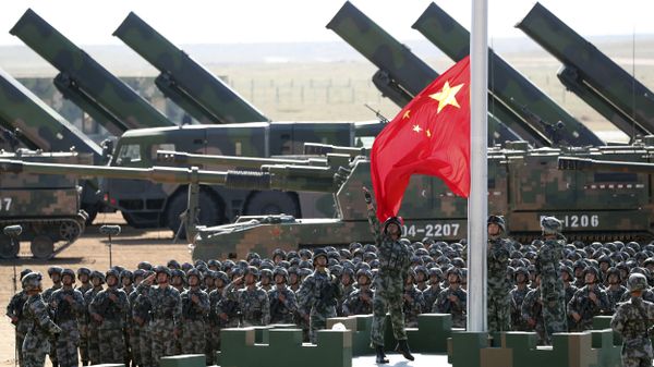 In this photo released by China's Xinhua News Agency, Chinese People's Liberation Army (PLA) troops perform a flag raising ceremony Sunday, July 30, 2017 for a military parade to commemorate the 90th anniversary of the founding of the PLA on Aug. 1 at Zhurihe training base in north China's Inner Mongolia Autonomous Region In this photo released by China's Xinhua News Agency, Chinese People's Liberation Army (PLA) troops perform a flag raising ceremony Sunday, July 30, 2017 for a military parade to commemorate the 90th anniversary of the founding of the PLA on Aug. 1 at Zhurihe training base in north China's Inner Mongolia Autonomous Region - Sputnik International