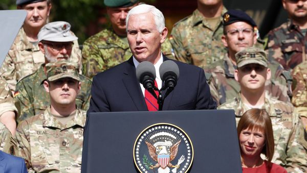 US Vice President Mike Pence delivers a speech next to Estonia's President Kersti Kaljulaid as they visit NATO's Enhanced Forward Presence mission and Estonian troops in Tallinn, Estonia July 31, 2017. US Vice President Mike Pence delivers a speech next to Estonia's President Kersti Kaljulaid as they visit NATO's Enhanced Forward Presence mission and Estonian troops in Tallinn, Estonia July 31, 2017. - Sputnik International