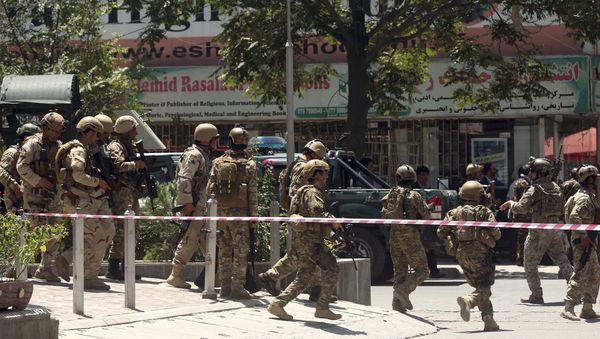 Security forces respond at the site of a suicide attack followed by a clash between Afghanistan's forces and IS fighters during an attack on Iraq embassy in Kabul, Afghanistan, Monday, July 31, 2017 Security forces respond at the site of a suicide attack followed by a clash between Afghanistan's forces and IS fighters during an attack on Iraq embassy in Kabul, Afghanistan, Monday, July 31, 2017 - Sputnik International