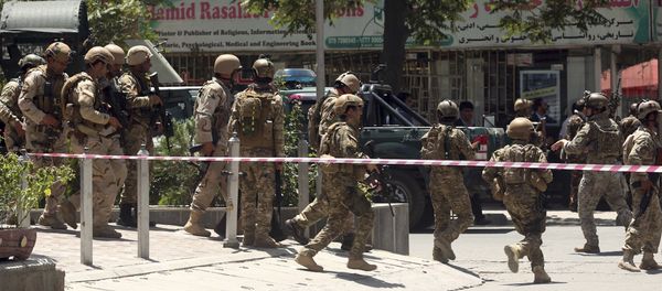 Security forces respond at the site of a suicide attack followed by a clash between Afghanistan's forces and IS fighters during an attack on Iraq embassy in Kabul, Afghanistan, Monday, July 31, 2017 Security forces respond at the site of a suicide attack followed by a clash between Afghanistan's forces and IS fighters during an attack on Iraq embassy in Kabul, Afghanistan, Monday, July 31, 2017 - Sputnik International