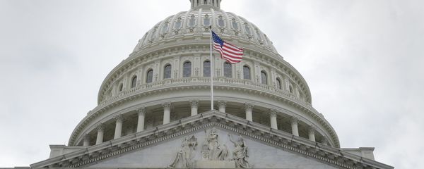 In this May 4, 2017, file photo, the U.S. flag flies in front of the Capitol dome on Capitol Hill in Washington - Sputnik International