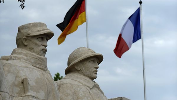 German flag and French flag are pictured in front of the War Memorial 1914-18, on May 27, 2016 in Verdun, eastern France German flag and French flag are pictured in front of the War Memorial 1914-18, on May 27, 2016 in Verdun, eastern France - Sputnik International