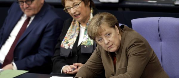 German Chancellor Angela Merkel, right, attends with German Foreign Minister Frank-Walter Steinmeier, left, and State Secretary Brigitte Zypries a meeting of the German Federal Parliament, Bundestag, at the Reichstag building in Berlin, Germany, Thursday, Feb. 25, 2016. German Chancellor Angela Merkel, right, attends with German Foreign Minister Frank-Walter Steinmeier, left, and State Secretary Brigitte Zypries a meeting of the German Federal Parliament, Bundestag, at the Reichstag building in Berlin, Germany, Thursday, Feb. 25, 2016. - Sputnik International