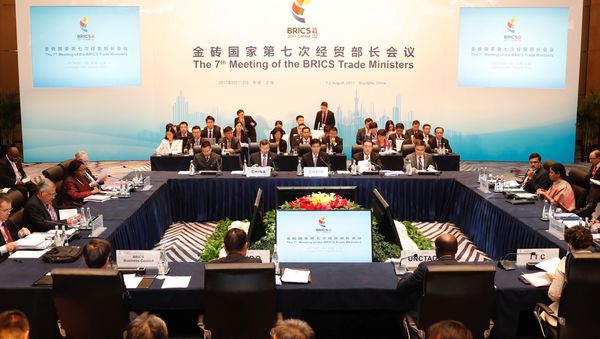 China's Commerce Minister Zhong Shan (center) speaks during the opening ceremony of the 7th Meeting of the BRICS Trade ministers in Shanghai, China August 1, 2017 - Sputnik International