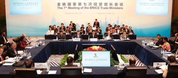 China's Commerce Minister Zhong Shan (center) speaks during the opening ceremony of the 7th Meeting of the BRICS Trade ministers in Shanghai, China August 1, 2017 - Sputnik International