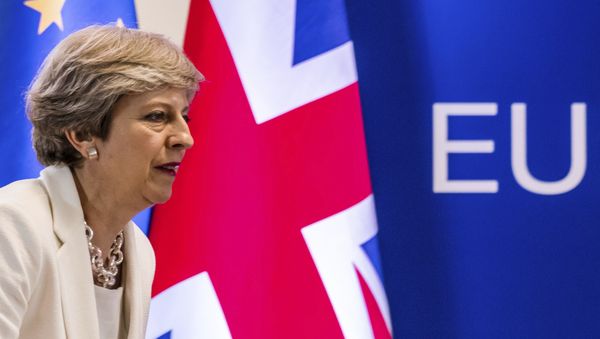 In this Friday, June 23, 2017 file photo British Prime Minister Theresa May prepares to address a media conference at an EU summit in Brussels. In this Friday, June 23, 2017 file photo British Prime Minister Theresa May prepares to address a media conference at an EU summit in Brussels. - Sputnik International