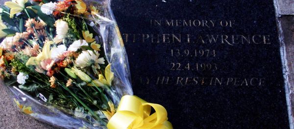 Flowers rest on the memorial plaque to the black teenager Stephen Lawrence, in Eltham located in southeast London Wednesday, March 22, 2000. - Sputnik International