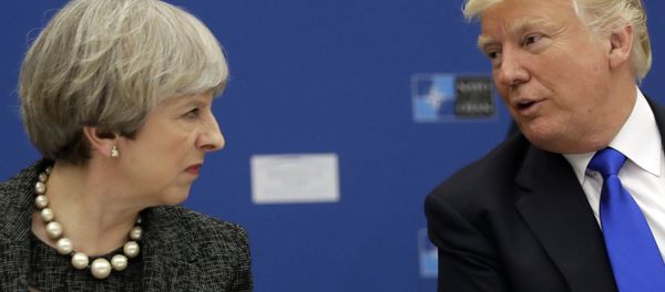 US President Donald Trump, right, speaks to British Prime Minister Theresa May during in a working dinner meeting at the NATO headquarters during a NATO summit of heads of state and government in Brussels on Thursday, May 25, 2017. US President Donald Trump, right, speaks to British Prime Minister Theresa May during in a working dinner meeting at the NATO headquarters during a NATO summit of heads of state and government in Brussels on Thursday, May 25, 2017. - Sputnik International