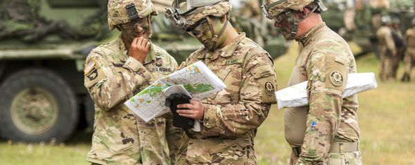 In this July 3, 2017 file photo, American soldiers get ready for NATO's Saber Guardian exercises, checking a map near Gyor, 120 kilometers west of Budapest, Hungary. - Sputnik International
