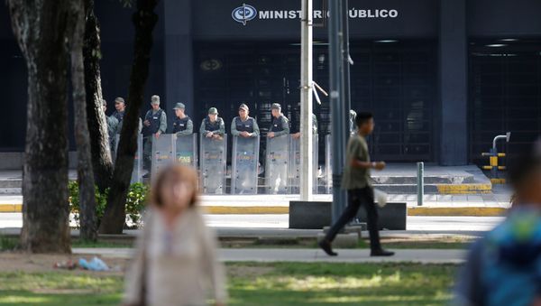 Venezuelan National Guard members stand guard in front of the Prosecutor's office in Caracas, Venezuela Venezuelan National Guard members stand guard in front of the Prosecutor's office in Caracas, Venezuela - Sputnik International