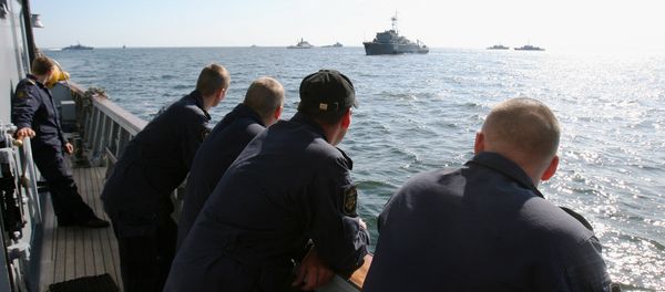 Navy members stand on the deck of a Lithuanian mine-sweeper during the Operation Open Spirit, the latest in a long drive to clear the potentially deably devices from the baltic, off the coast of Klaipeda, in the Baltic Sea, on September 7, 2010 - Sputnik International