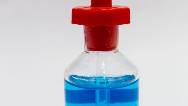 A glass bottle - Sputnik International