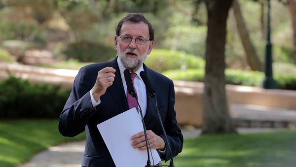 Spanish Prime Minister Mariano Rajoy gestures during a news conference after his traditional summer meeting with King Felipe at Marivent Palace in Palma, on the Spanish island of Mallorca, Spain, August 7, 2017 - Sputnik International