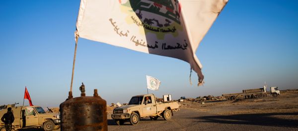 Members of the Hashd Al Shaabi (Popular Mobilisation Units) are seen on the tarmac of the Tal Afar airport on November 20, 2016 Members of the Hashd Al Shaabi (Popular Mobilisation Units) are seen on the tarmac of the Tal Afar airport on November 20, 2016 - Sputnik International