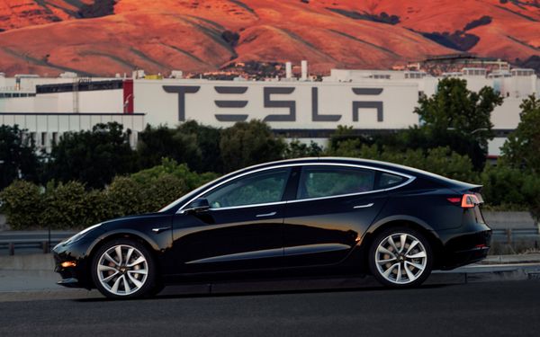 First production model of Tesla Model 3 out the assembly line is seen in this undated handout photo from Tesla Motors. - Sputnik International