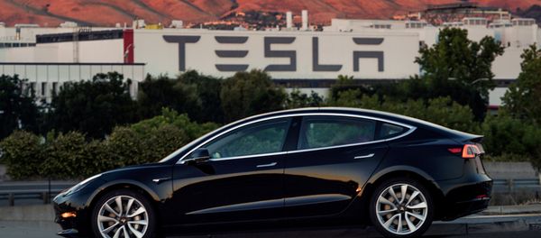 First production model of Tesla Model 3 out the assembly line is seen in this undated handout photo from Tesla Motors. First production model of Tesla Model 3 out the assembly line is seen in this undated handout photo from Tesla Motors. - Sputnik International