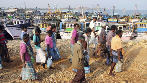 (File) A group of Indian fishermen walk towards their vessels after being released in Jaffna, Sri Lanka, Monday, March 17, 2014 (File) A group of Indian fishermen walk towards their vessels after being released in Jaffna, Sri Lanka, Monday, March 17, 2014 - Sputnik International