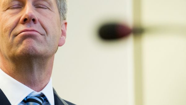 German ex-President Christian Wulff grimaces as he arrives for his trial at a court in Hannover, northern Germany, Thursday, Nov. 14, 2013. German ex-President Christian Wulff grimaces as he arrives for his trial at a court in Hannover, northern Germany, Thursday, Nov. 14, 2013. - Sputnik International