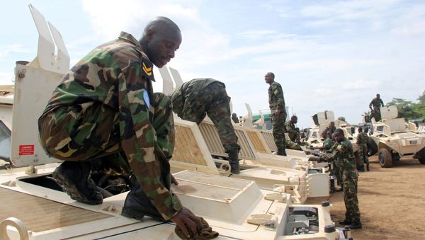 Rwandan peacekeepers from the Rwanda Defence Force (RDF) check their armoured personnel carriers (APC) before a parade in Juba, South Sudan, August 8, 2017 - Sputnik International