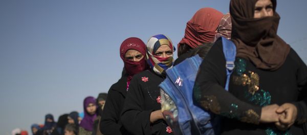 Women displaced from Mosul, Iraq at a refugee camp Women displaced from Mosul, Iraq at a refugee camp - Sputnik International