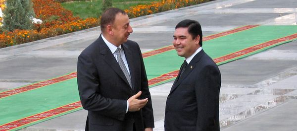 President of Turkmenistan Gurbanguly Berdymukhammedov (R) listens to his Azeri counterpart Ilham Aliyev on November 28, 2008 in Ashgabat prior talks about energy cooperation - Sputnik International