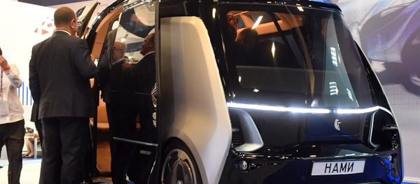 A KAMAZ 'Shuttle' self-driving bus at KAMAZ's stand at the 2017 St. Petersburg International Economic Forum. File photo - Sputnik International