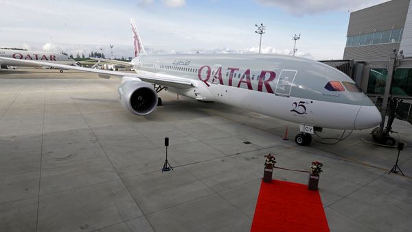 In this Nov. 4, 2015 file photo, a Boeing 787 airplane purchased by Qatar Airways is shown during a delivery ceremony in Everett, Washington. In this Nov. 4, 2015 file photo, a Boeing 787 airplane purchased by Qatar Airways is shown during a delivery ceremony in Everett, Washington. - Sputnik International