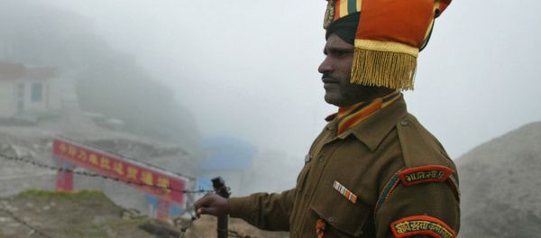 In this photograph taken on July 10, 2008 an Indian soldier stands guard at the ancient Nathu La border crossing between India and China In this photograph taken on July 10, 2008 an Indian soldier stands guard at the ancient Nathu La border crossing between India and China - Sputnik International