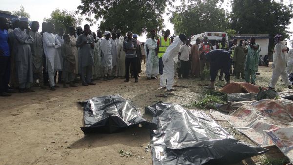 People mourn over the bodies of suicide bomb attack victims in a village near Maiduguri, Nigeria, Wednesday, July 12, 2017 People mourn over the bodies of suicide bomb attack victims in a village near Maiduguri, Nigeria, Wednesday, July 12, 2017 - Sputnik International