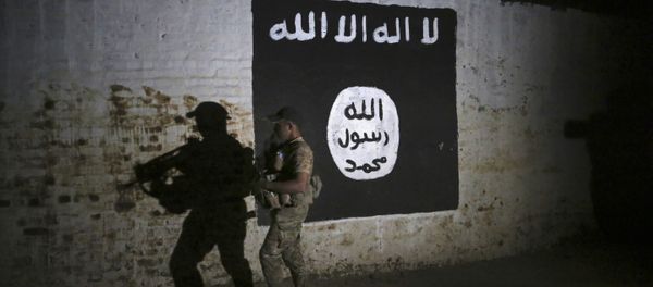 An Iraqi soldier inspects a recently-discovered train tunnel, adorned with an Islamic State group flag, that belonged to the former Baghdad to Mosul line, that was turned it to a training camp for IS fighters, in western Mosul, Iraq, Wednesday, March 1. 2017 An Iraqi soldier inspects a recently-discovered train tunnel, adorned with an Islamic State group flag, that belonged to the former Baghdad to Mosul line, that was turned it to a training camp for IS fighters, in western Mosul, Iraq, Wednesday, March 1. 2017 - Sputnik International