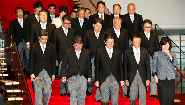 Japan's Prime Minister Shinzo Abe (front C) leads his cabinet ministers as they attend a photo session at Abe's official residence in Tokyo, Japan, August 3, 2017 - Sputnik International