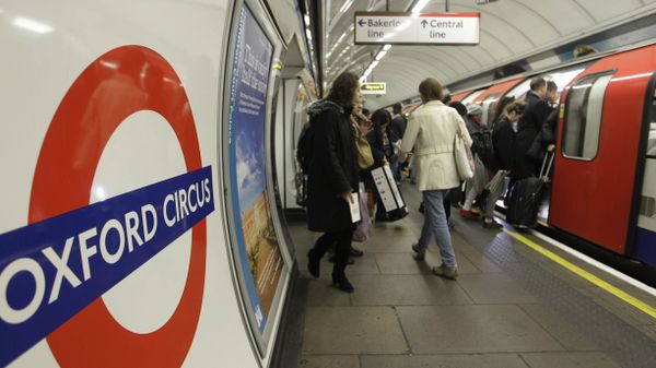 People board an underground Tube train at Oxford Circus underground station in London. (File) People board an underground Tube train at Oxford Circus underground station in London. (File) - Sputnik International