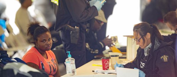 Refugees are processed by the Royal Canadian Mounted Police after crossing the Canada/US border near Hemmingford, Quebec Refugees are processed by the Royal Canadian Mounted Police after crossing the Canada/US border near Hemmingford, Quebec - Sputnik International