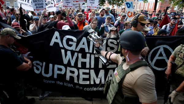 Members of white nationalists are met by a group of counter-protesters in Charlottesville, Virginia, U.S - Sputnik International