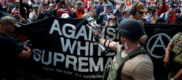 Members of white nationalists are met by a group of counter-protesters in Charlottesville, Virginia, U.S Members of white nationalists are met by a group of counter-protesters in Charlottesville, Virginia, U.S - Sputnik International
