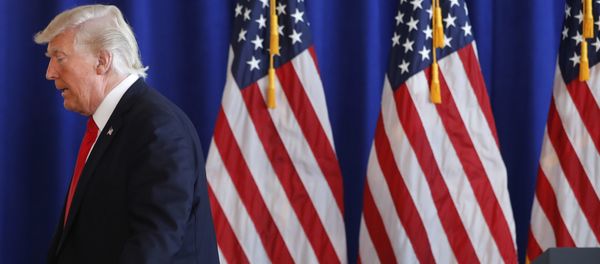 President Donald Trump walks away after speaking about the ongoing situation in Charlottesville, Va., Saturday, Aug. 12, 2017 at Trump National Golf Club in Bedminster, N.J. President Donald Trump walks away after speaking about the ongoing situation in Charlottesville, Va., Saturday, Aug. 12, 2017 at Trump National Golf Club in Bedminster, N.J. - Sputnik International