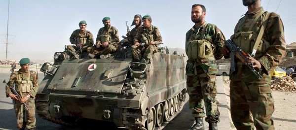 Afghan National Army soldiers stand near an armored military tank at a square in Kabul, Afghanistan on Tuesday, May 30, 2006. - Sputnik International