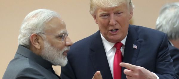 India's Prime Minister Narendra Modi, in conversation with U.S. president Donald Trump during a working session of the G20 summit in Hamburg, Germany, Saturday, July 8, 2017 India's Prime Minister Narendra Modi, in conversation with U.S. president Donald Trump during a working session of the G20 summit in Hamburg, Germany, Saturday, July 8, 2017 - Sputnik International